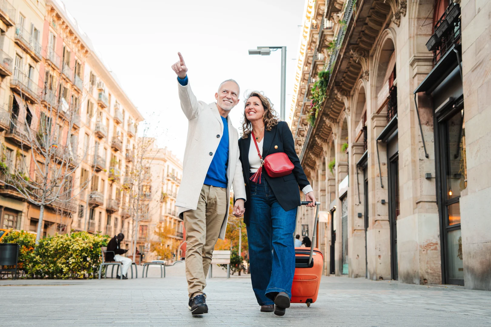 Generation X couple traveling in a European city, an example of cultural tourism and city breaks.