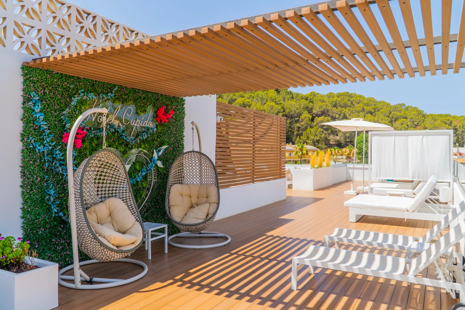 Mediterranean hotel terrace with lounge area and carefully decorated, designed for the relaxation of the guest.